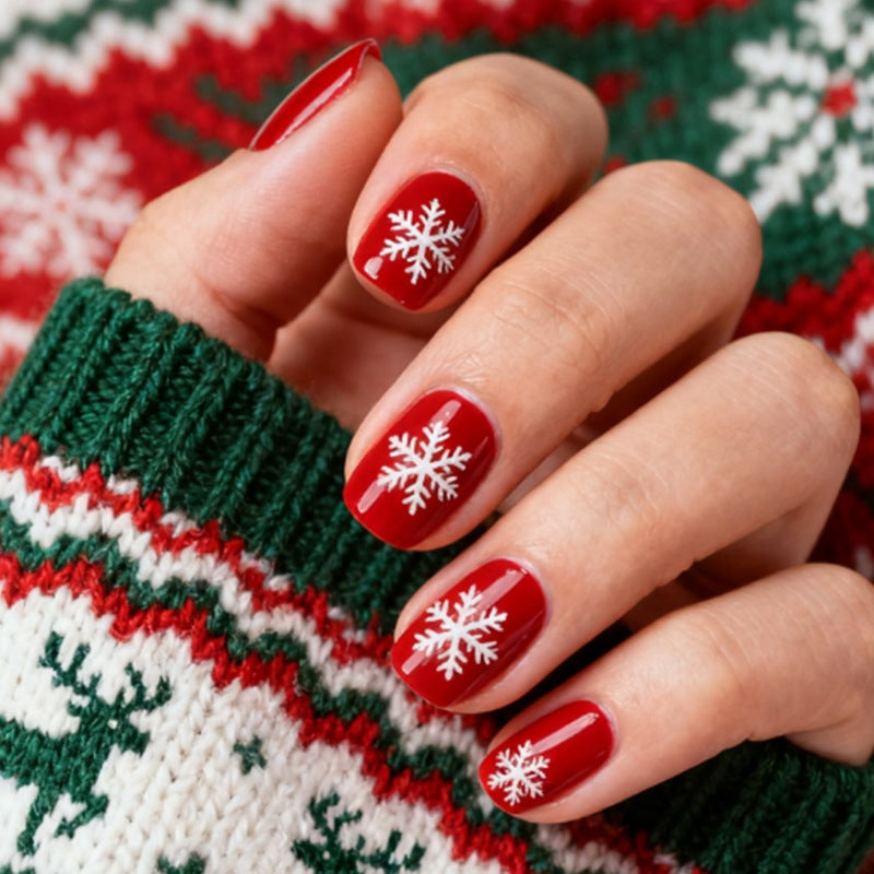 Festive artificial nails with winter snowflake patterns Stornfield