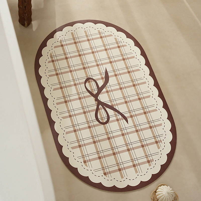 Rectangular wipeable placemat with checked pattern, wavy decorative edge and bow motif Stornfield