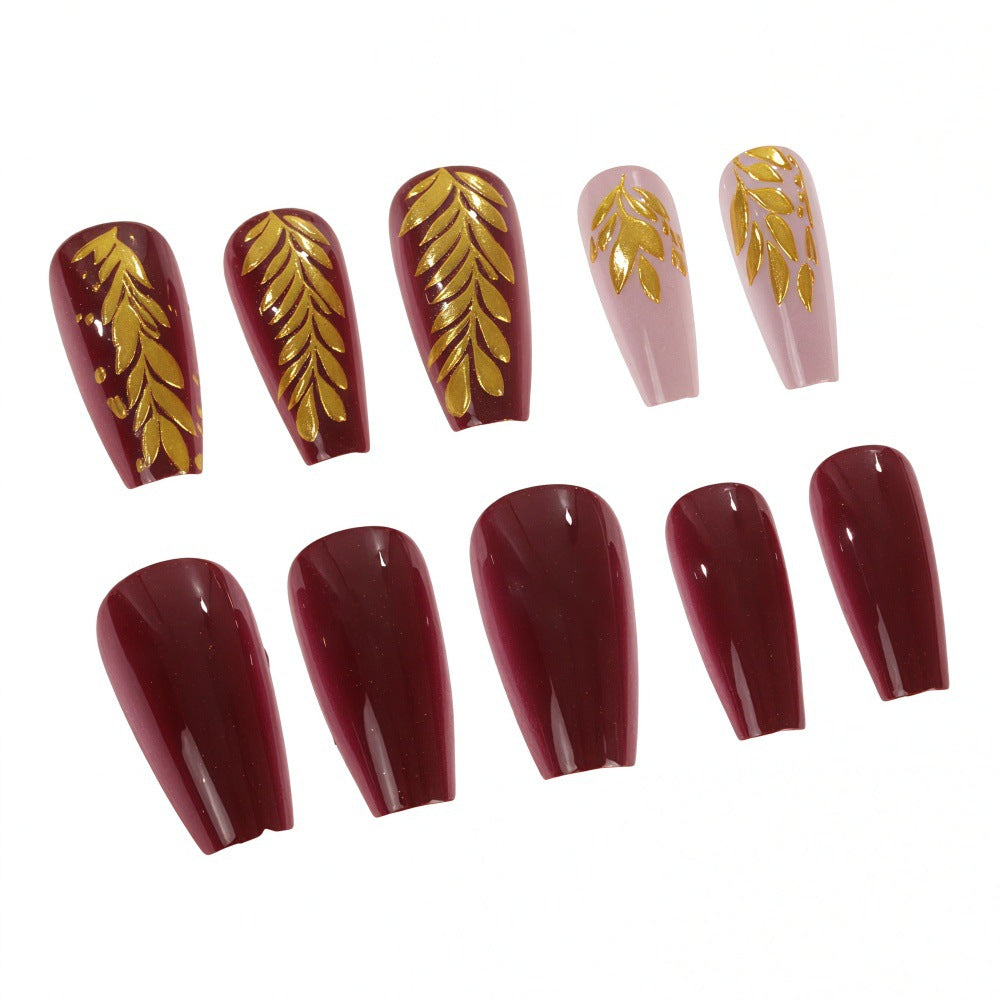 Elegant artificial nails with gold decoration Stornfield
