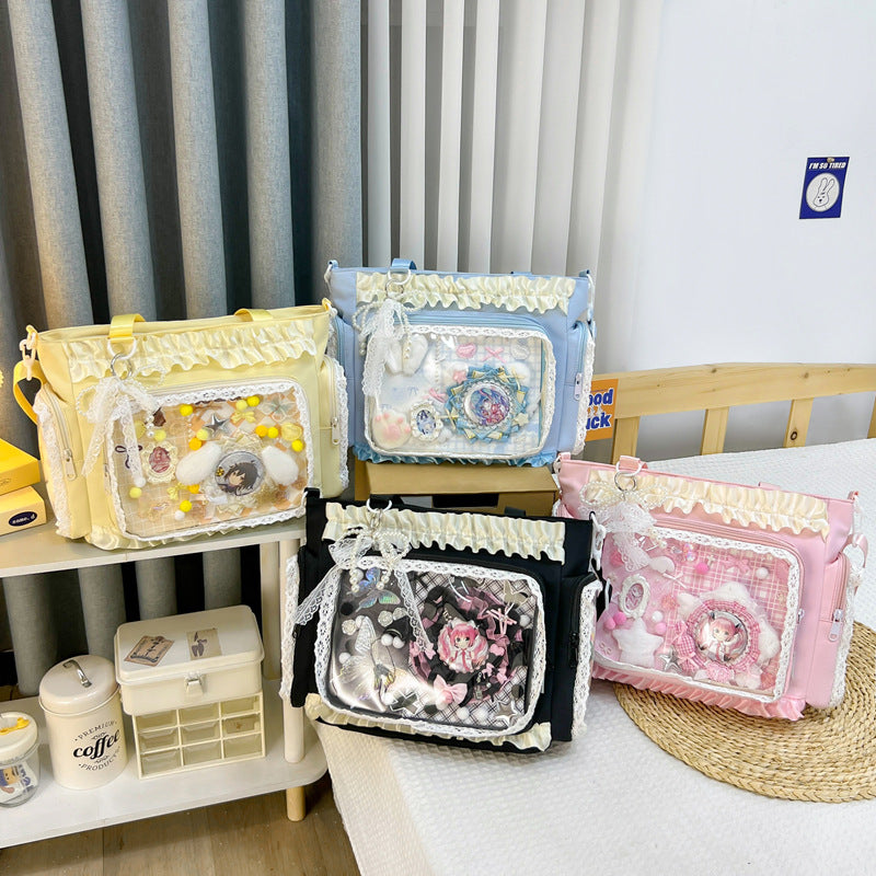 Shoulder bag with transparent front and playful applications Stornfield