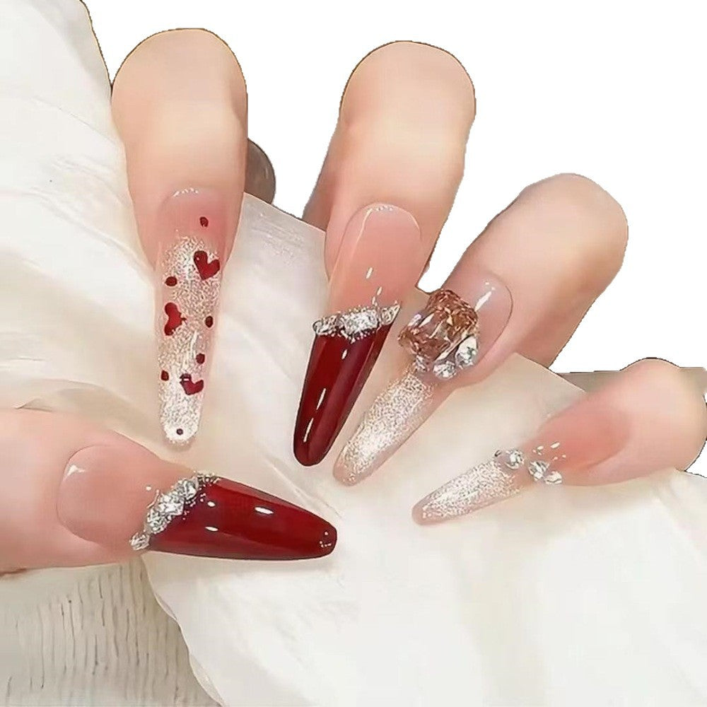 Glamorous Stiletto Nail Art Extensions with Heart Accents