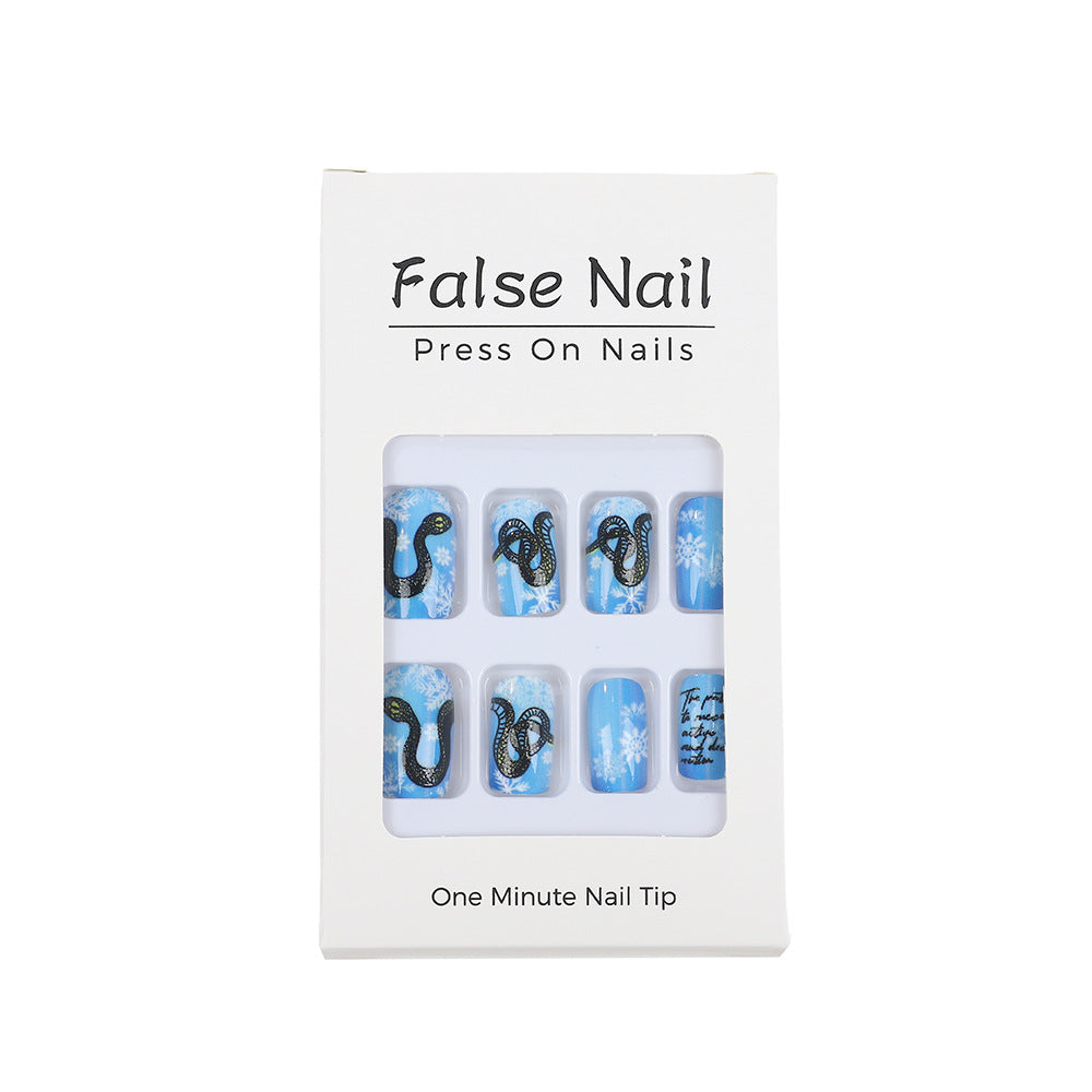 Creative art nails with snowflake and snake motif Stornfield