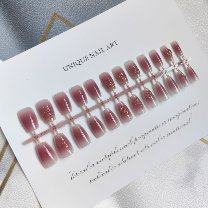 Stylish art false nails with heart design and glitter Stornfield