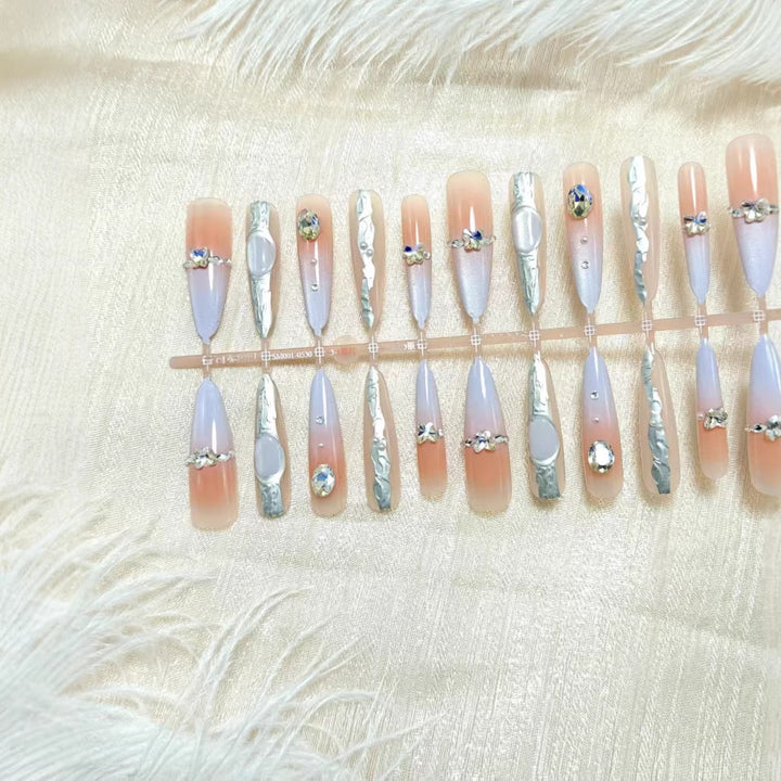 Artificial nails with elegant glitter and crystal accents Stornfield