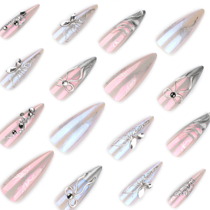 Artful stiletto nails with delicate silver casting decoration Stornfield