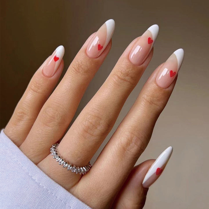 Glamorous nail art with heart decorations Stornfield