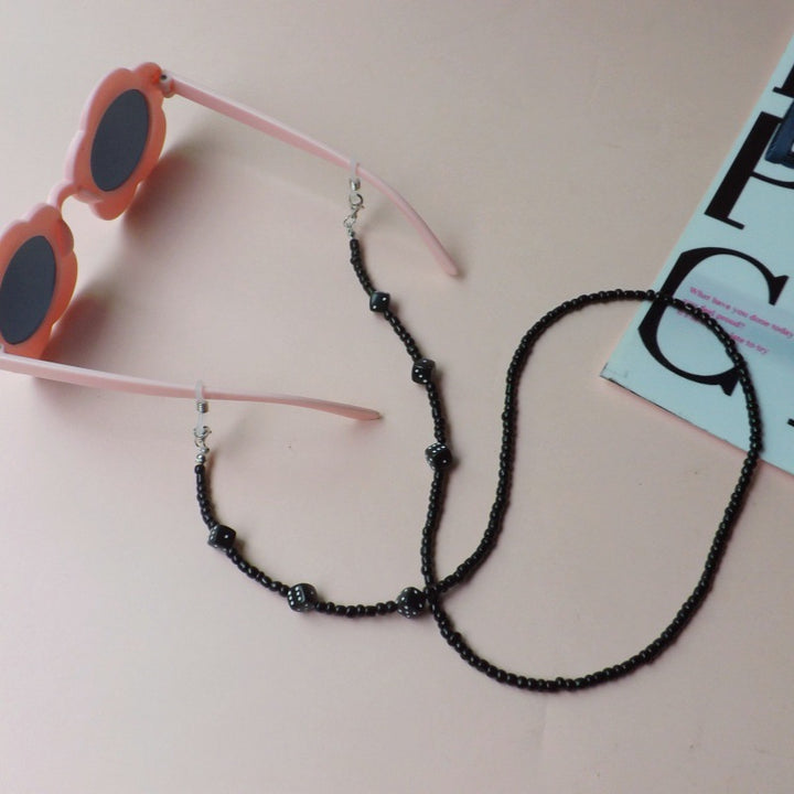 Sunglasses with fashionable pearl band Stornfield