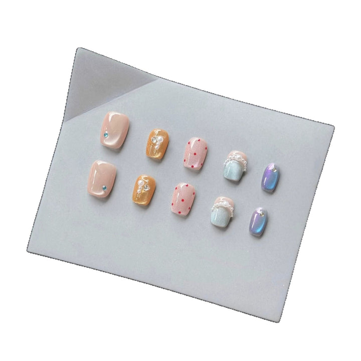 Decorative Press-On Nail Art Set with Unique Gem and Pearl Accents