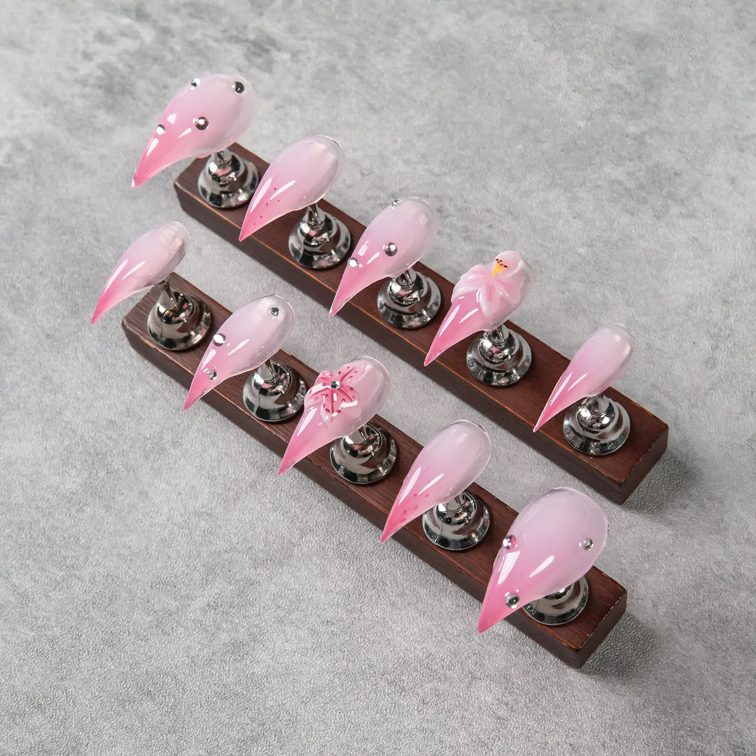 Artistic Stiletto Press-On Nails with Floral and Gem Accents