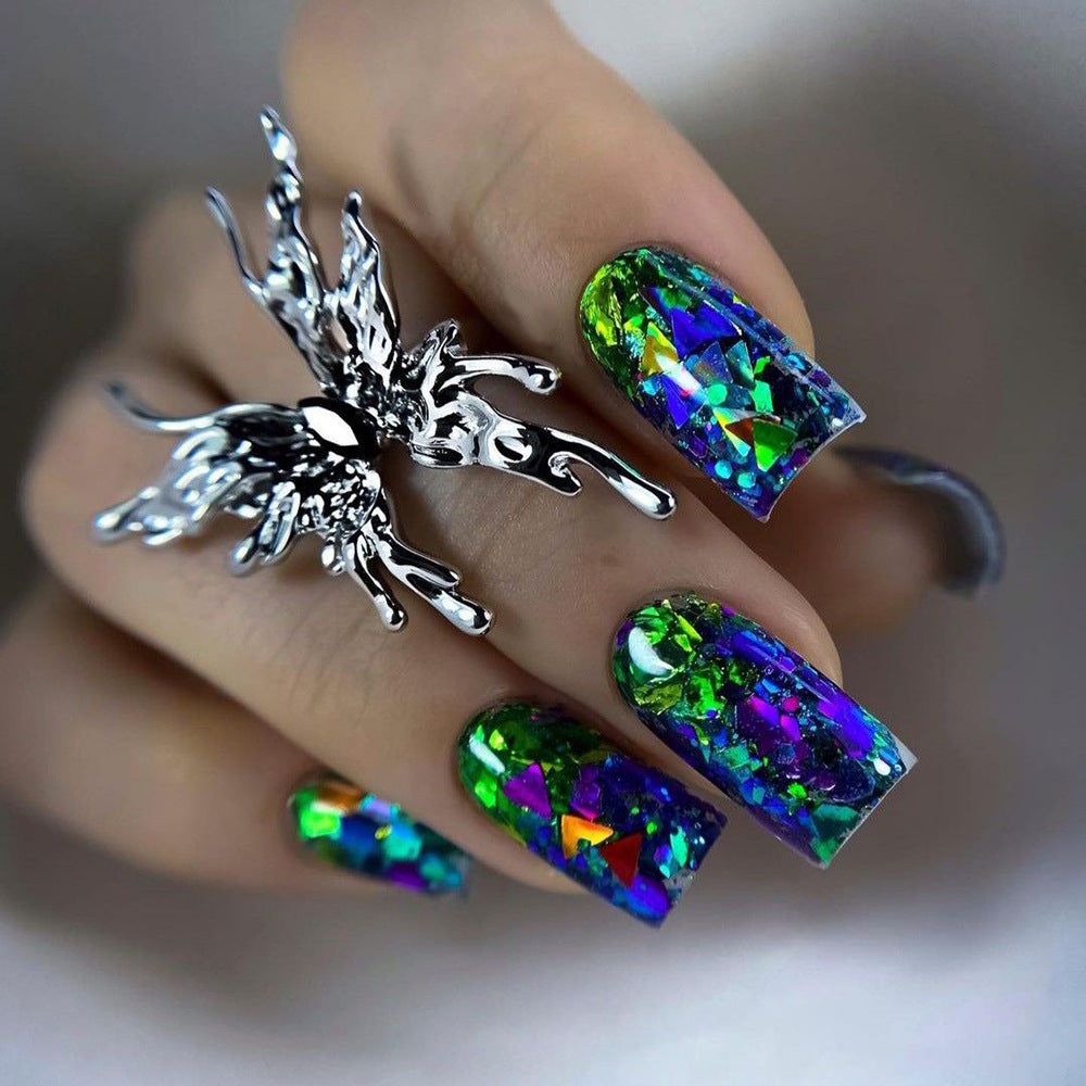 Artificial nails with sparkling glitter design and holographic accents Stornfield