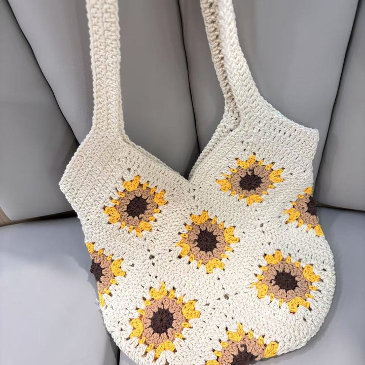 Hand-knotted shoulder bag with sunflower motif Stornfield