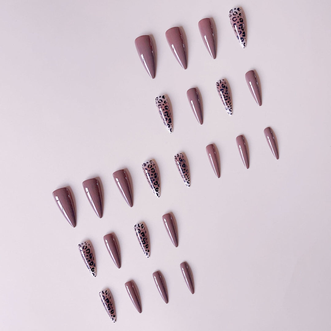 Nail set with elegant leopard pattern and modern stiletto design Stornfield