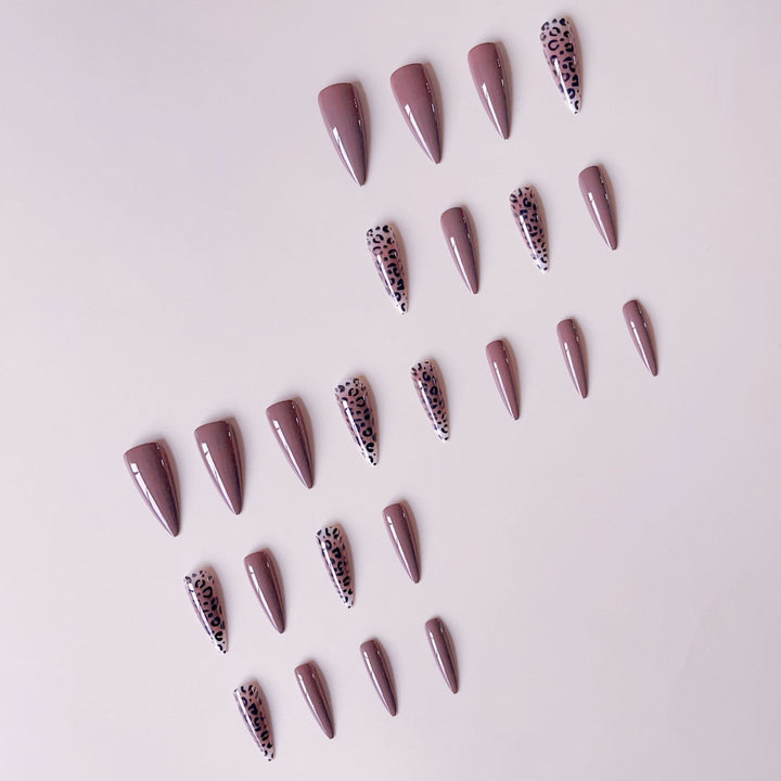 Nail set with elegant leopard pattern and modern stiletto design Stornfield