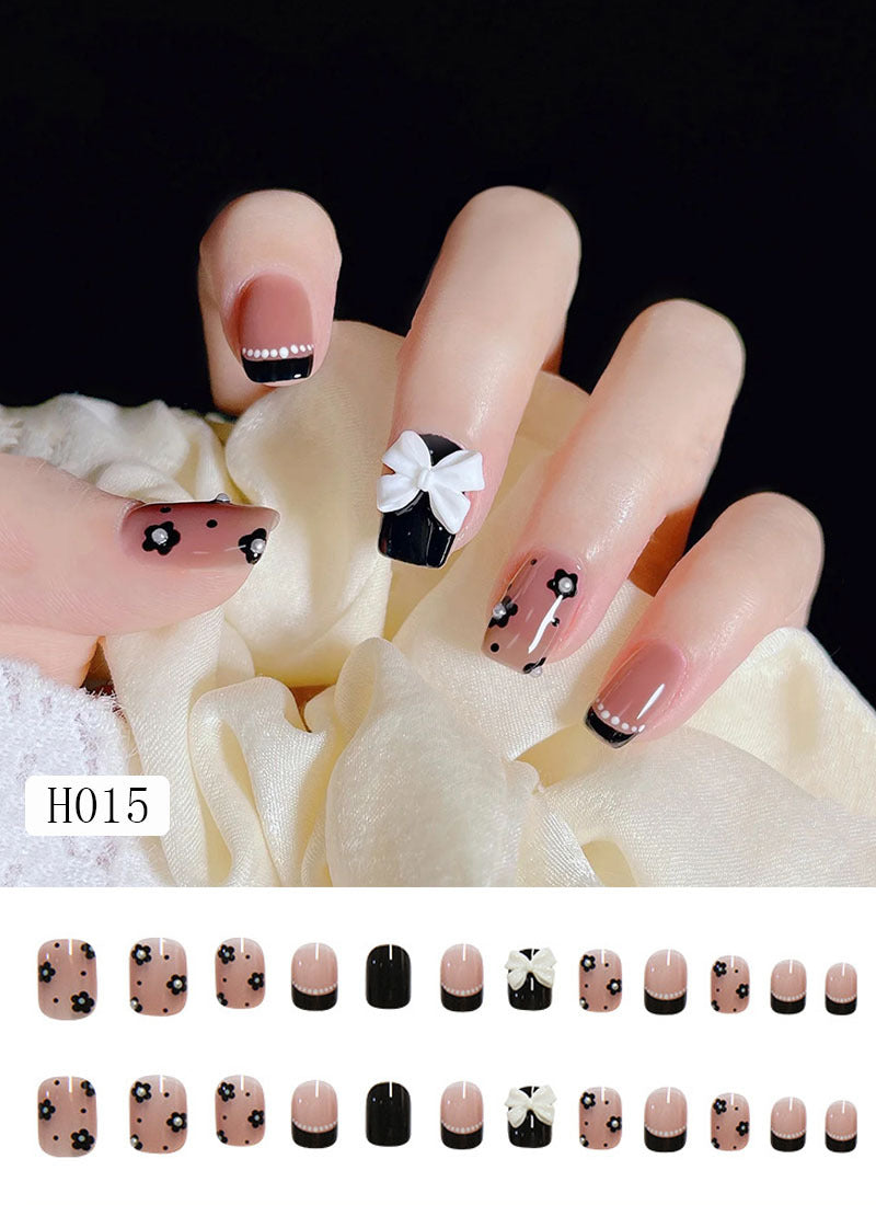 Artificial nail tips with bow design Stornfield