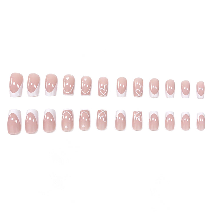Heart-Embellished French Tip Nail Art Stornfield