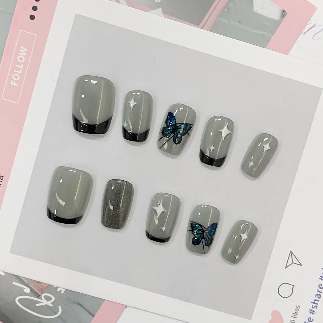 Artistic nail tips with butterfly designs Stornfield
