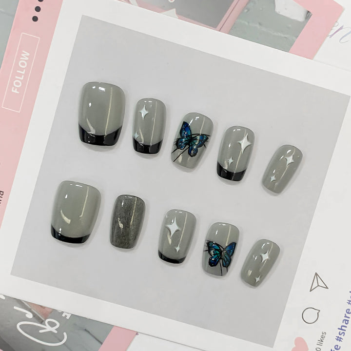 Artistic nail tips with butterfly designs Stornfield