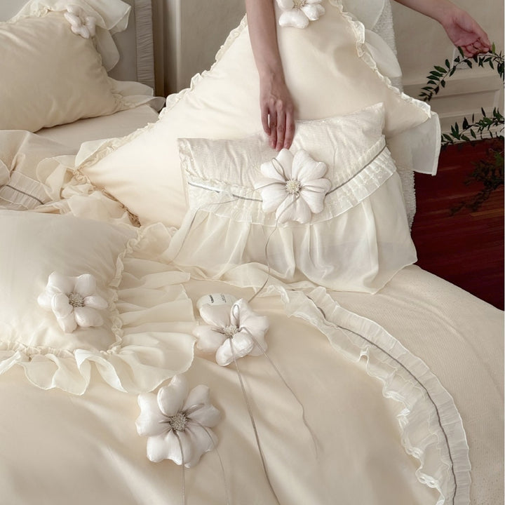Romantic bedding set made of cotton satin with ruffled flounce, layered ruffles, and decorative fabric flowers
