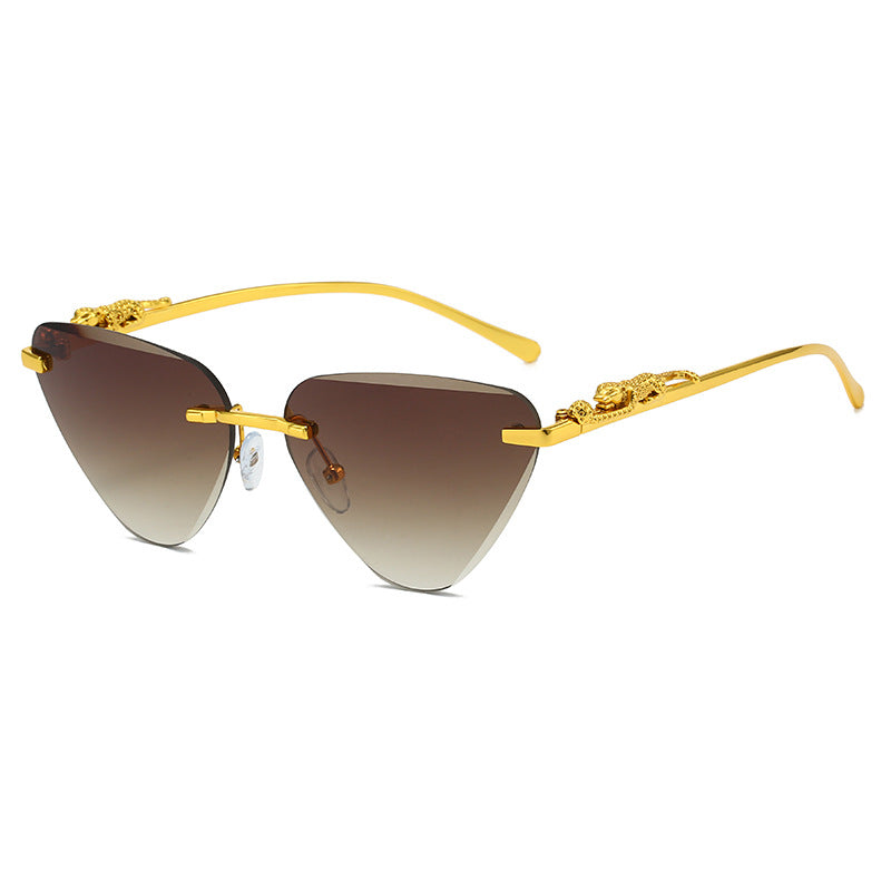 Women's Designer Sunglasses with Creative, Triangular Frame and Elegant Gold Accents Stornfield