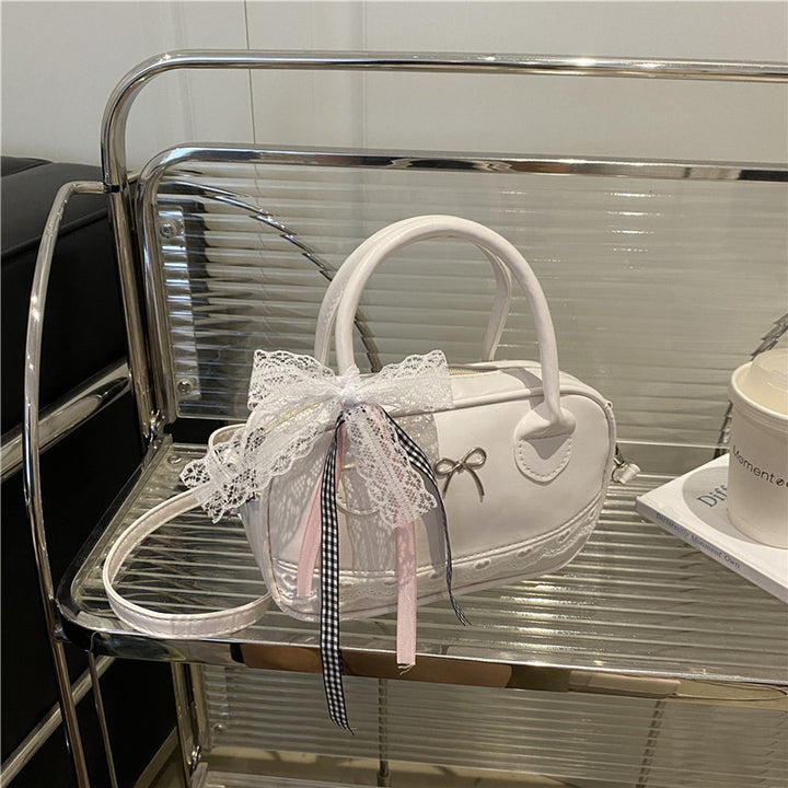 Elegant Lace-Trimmed Bow Handbag Stornfield