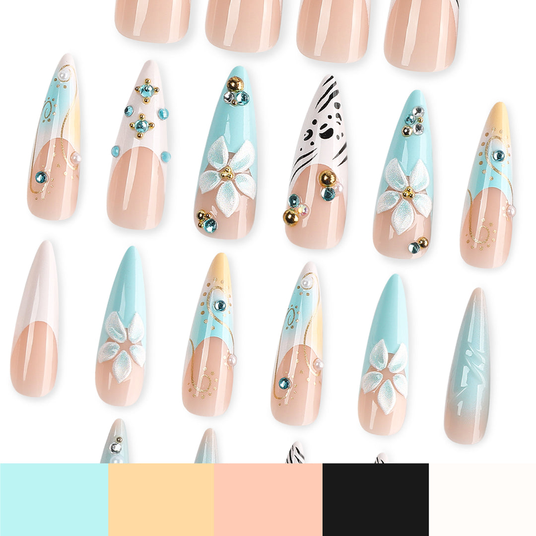 Artistic stiletto nails with floral accents and glitter details Stornfield