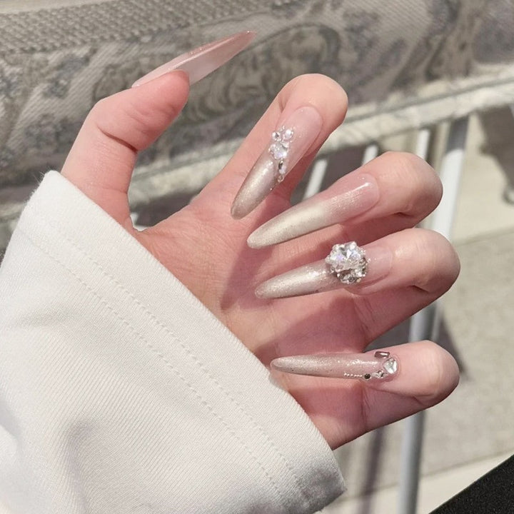 Artificial nail set with elegant tips and crystal accents Stornfield