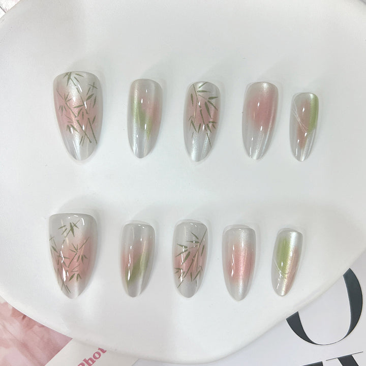 Artificial nail tips with elegant design and botanical accents Stornfield
