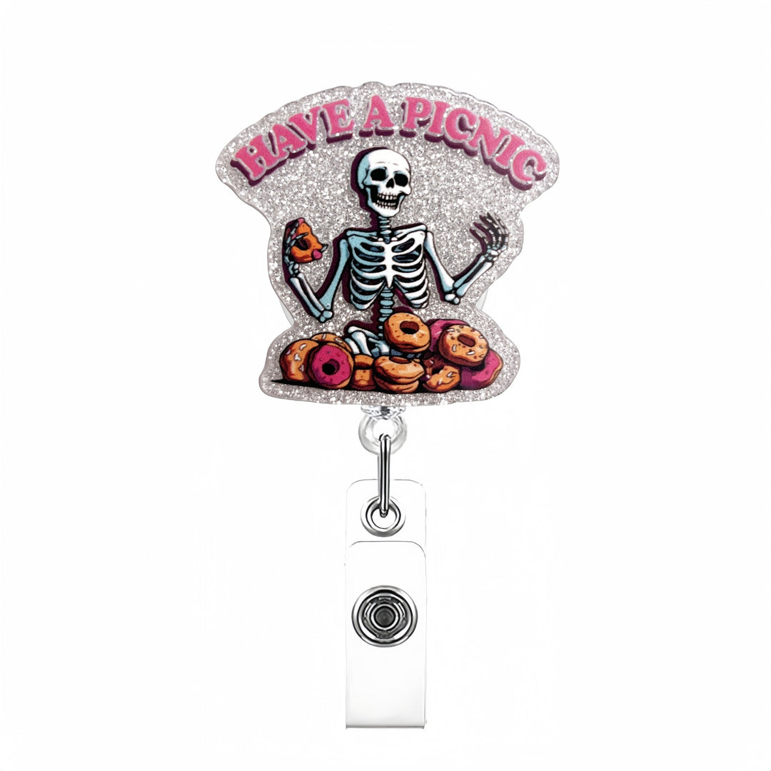 Expandable badge holder with anatomical heart pendant