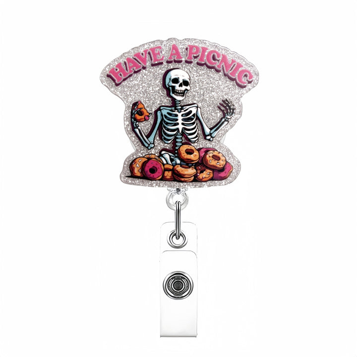 Expandable badge holder with anatomical heart pendant