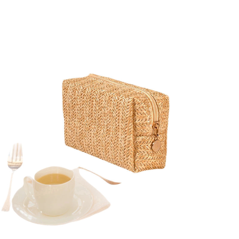 Cosmetic bag made of natural rafia material with elegant design Stornfield