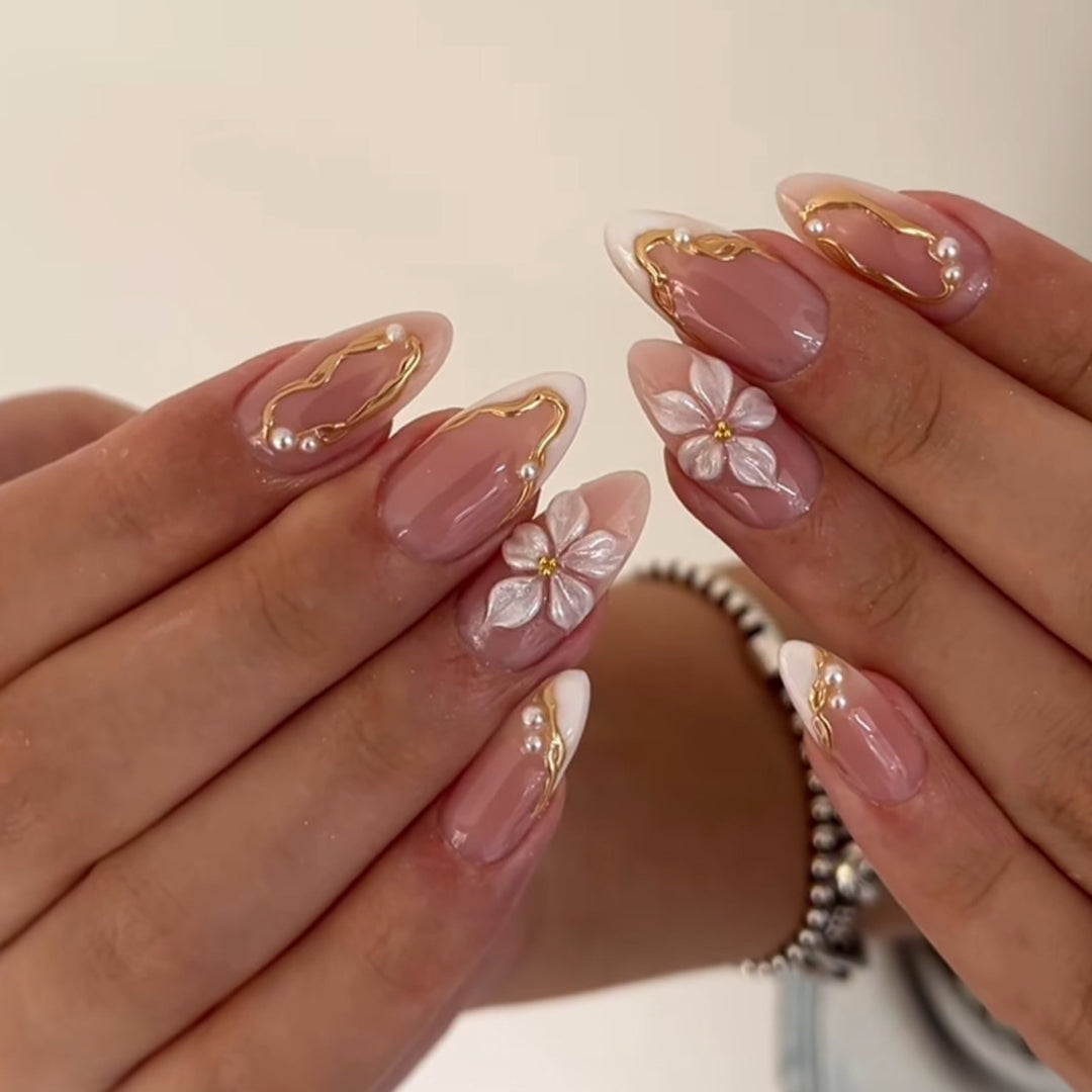 Artful acrylic nails with elegant floral accents Stornfield