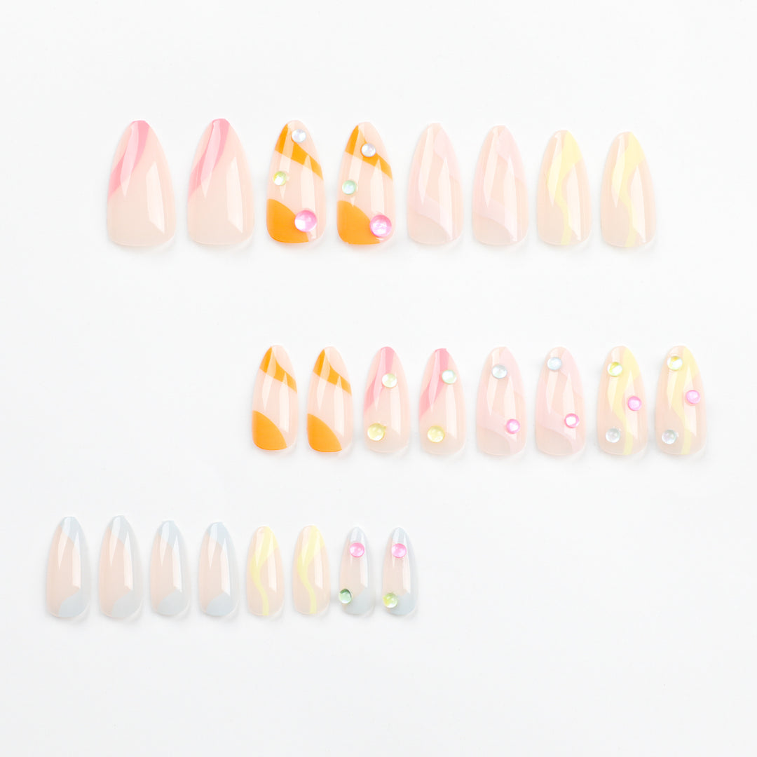 Artistic Nail Extensions with Colorful Design and Glitter Accents Stornfield