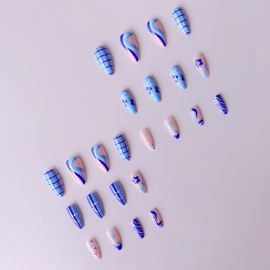 Artificial nail set with colorful flower pattern and creative accents Stornfield