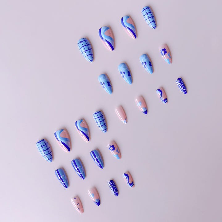 Artificial nail set with colorful flower pattern and creative accents Stornfield