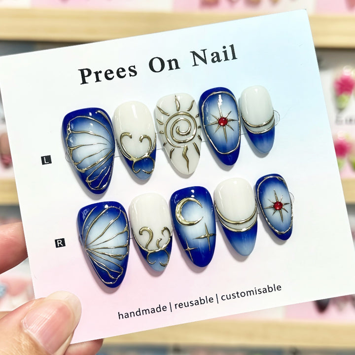 Artistic Press-On Nail Set with Elegant Gold Designs