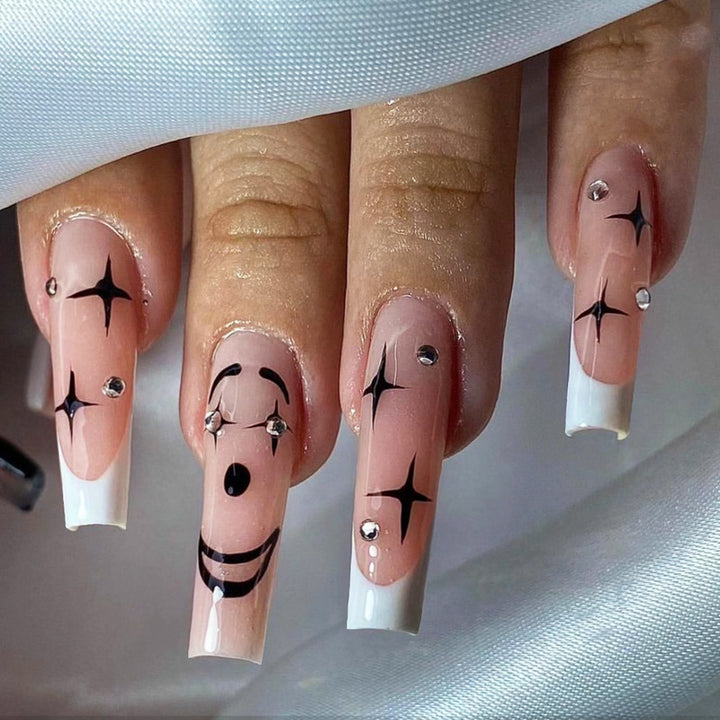 Artistic Press-On Nail Set with Unique Star and Graphic Designs Stornfield