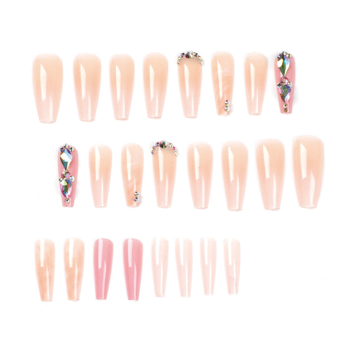 Glamorous artificial nails with gemstone embellishments Stornfield