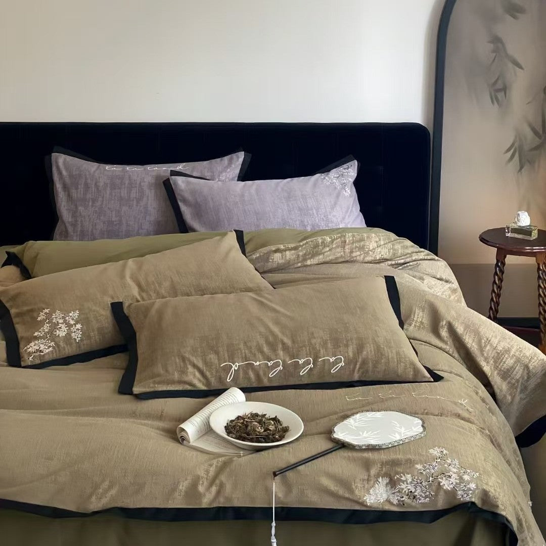 Luxurious embroidered cotton bedding set with pillowcase and reversible function