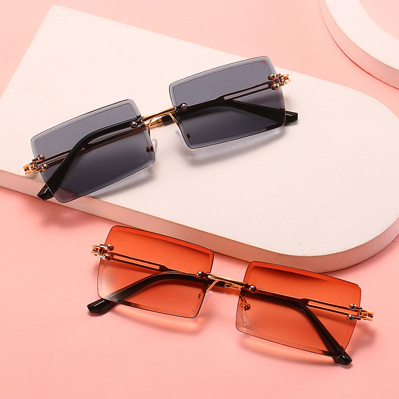 Women's stylish sunglasses with unique rectangular frame and sparkling details Stornfield