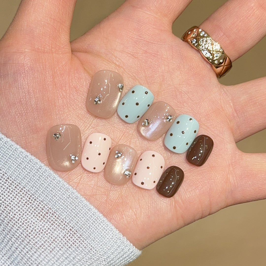 Acrylic nails with rhinestones and glitter Stornfield