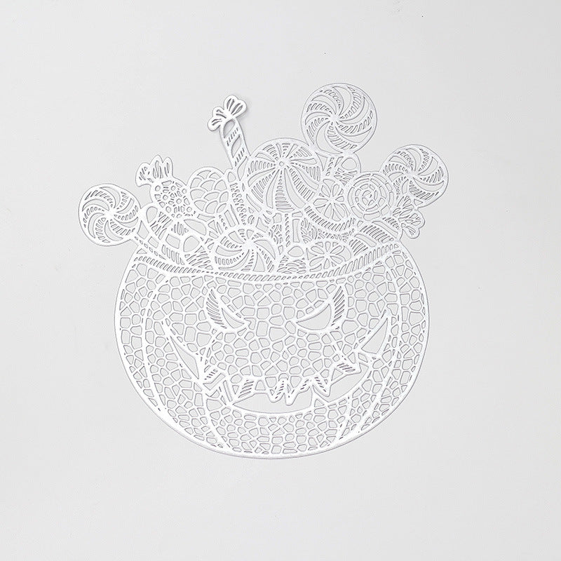 Filigree laser-cut pumpkin placemat made of wood for Halloween table decoration