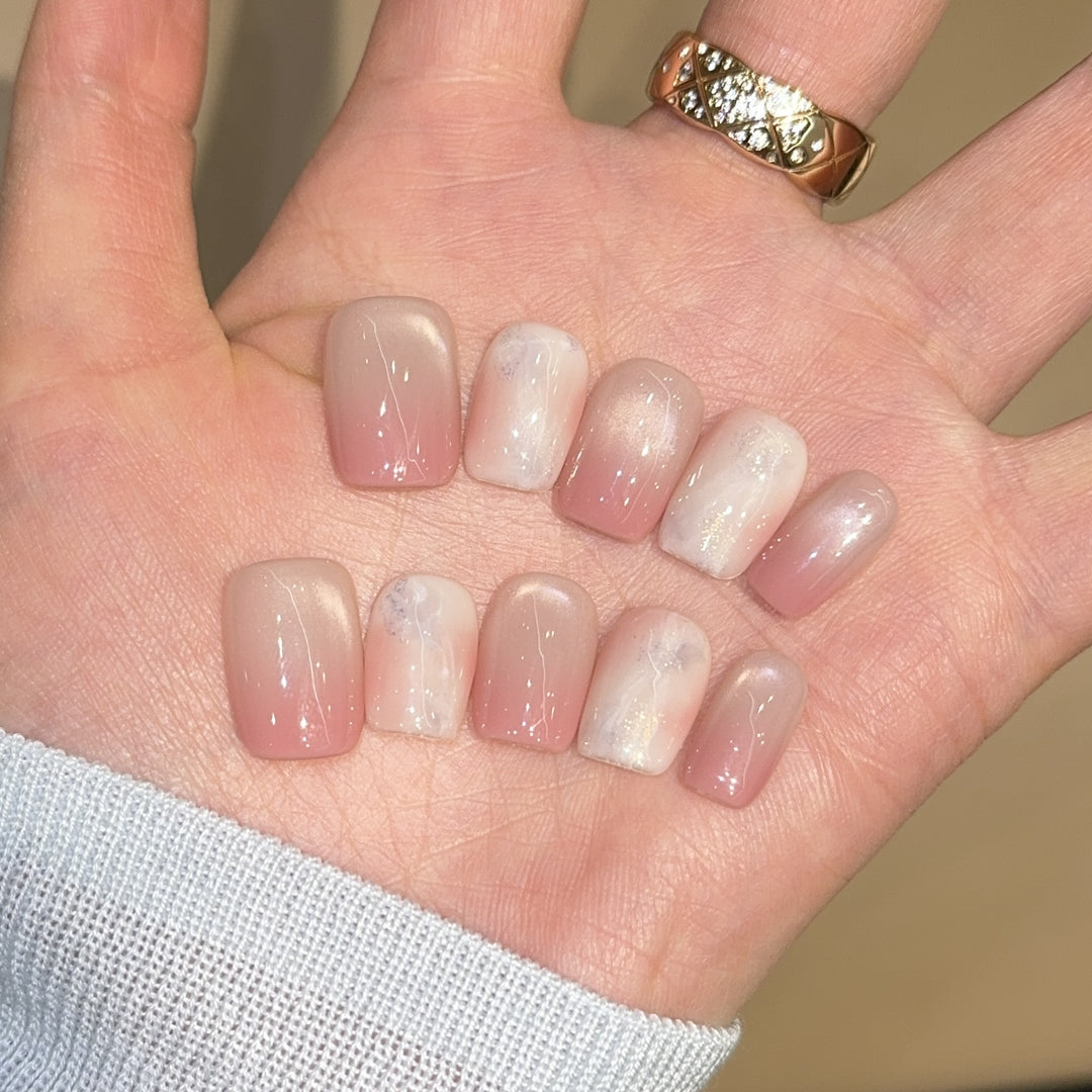 Artificial nails with elegant gradient colors and holographic accents Stornfield