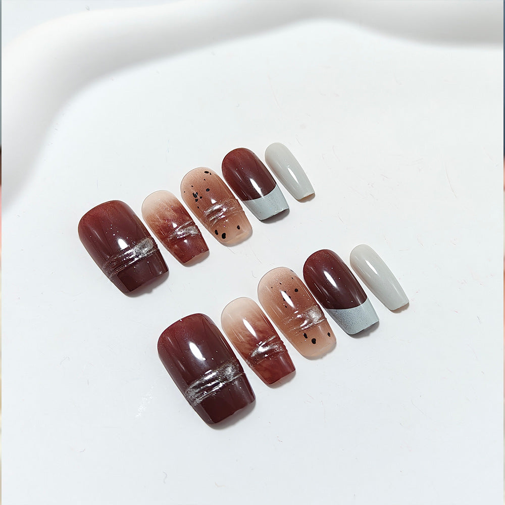Trendy artificial nails with elegant metallic and gradient effects Stornfield