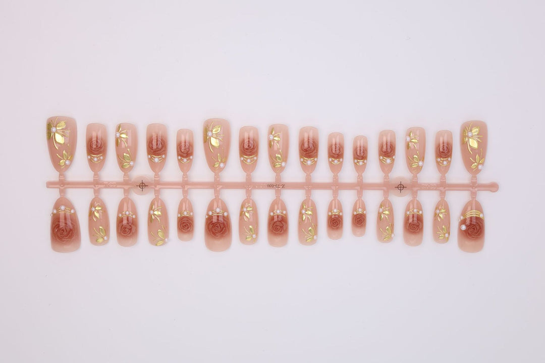 Artificial nail set with romantic rose designs and golden embellishments Stornfield