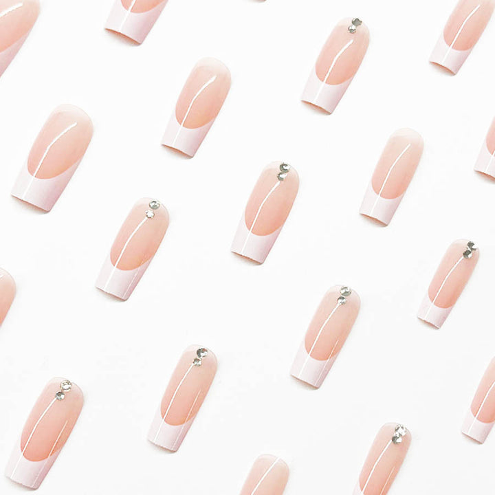 Elegant artificial nail set with high-gloss finish and rhinestone decorations Stornfield