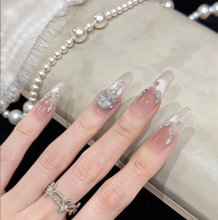 Glamorous artificial nail tips with rhinestone accents Stornfield