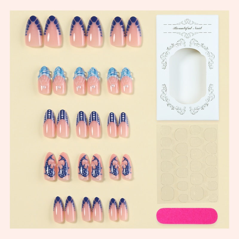Acrylic nail set with elegant designs and glamorous accents Stornfield