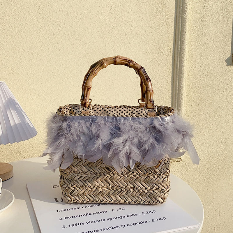 Elegant handbag with feathers and bamboo handles Stornfield
