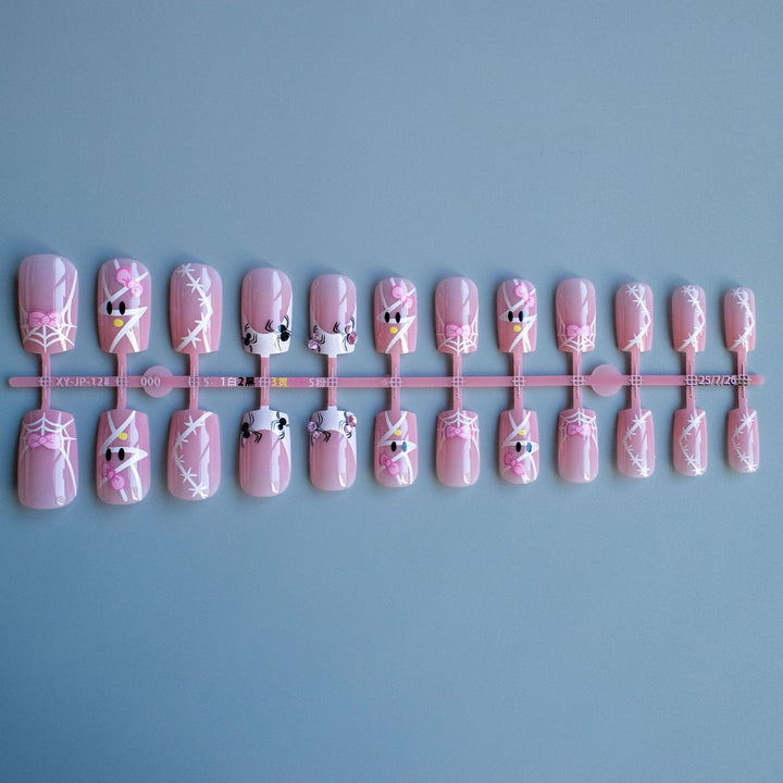 Decorative Nail Art Set with Bow and Spider Web Design