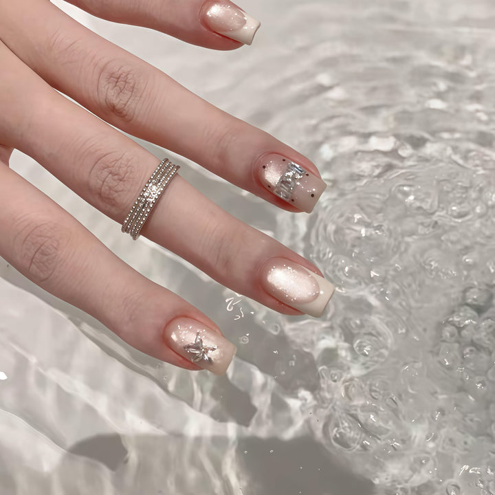 Elegant artificial nails with shimmer and glitter Stornfield